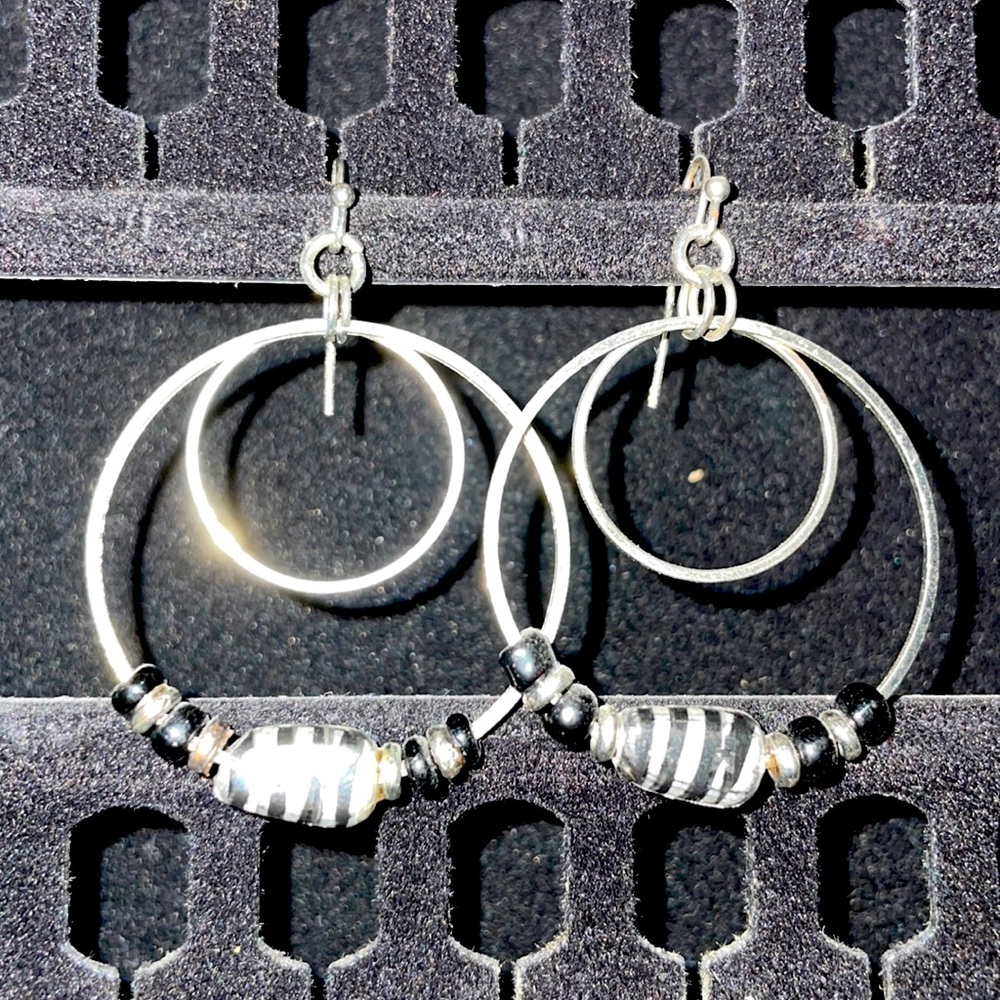 Dangling Zebra hoop earrings